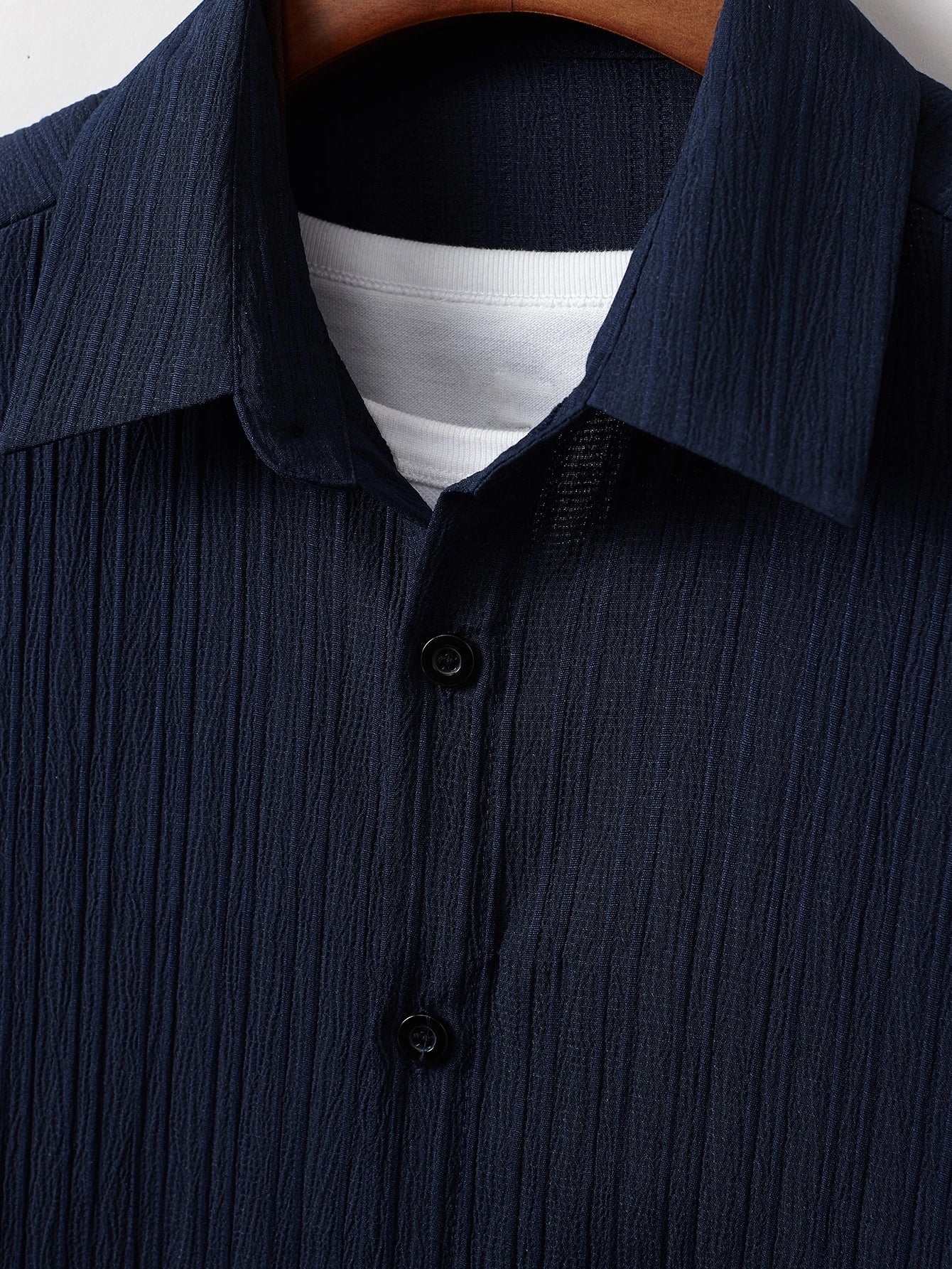 Men's suit (shirt and trousers) with a comfortable fit and simple design, featuring half buttons, suitable for summer.